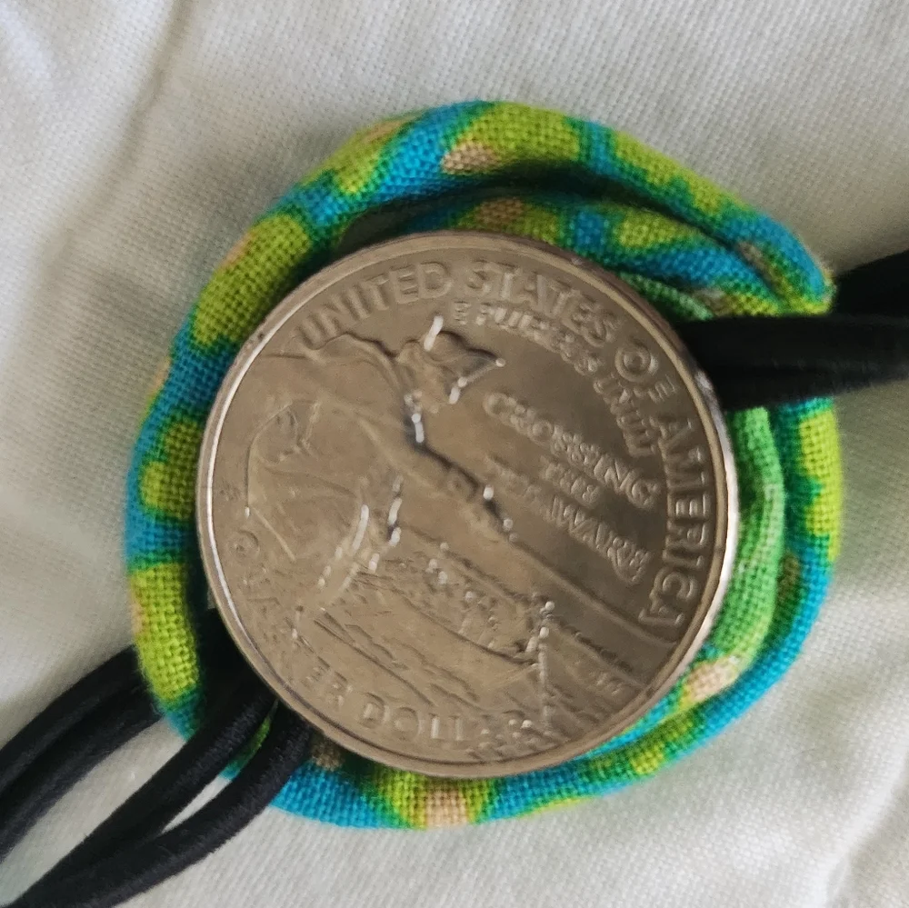Multi colored coiled fabric necklace